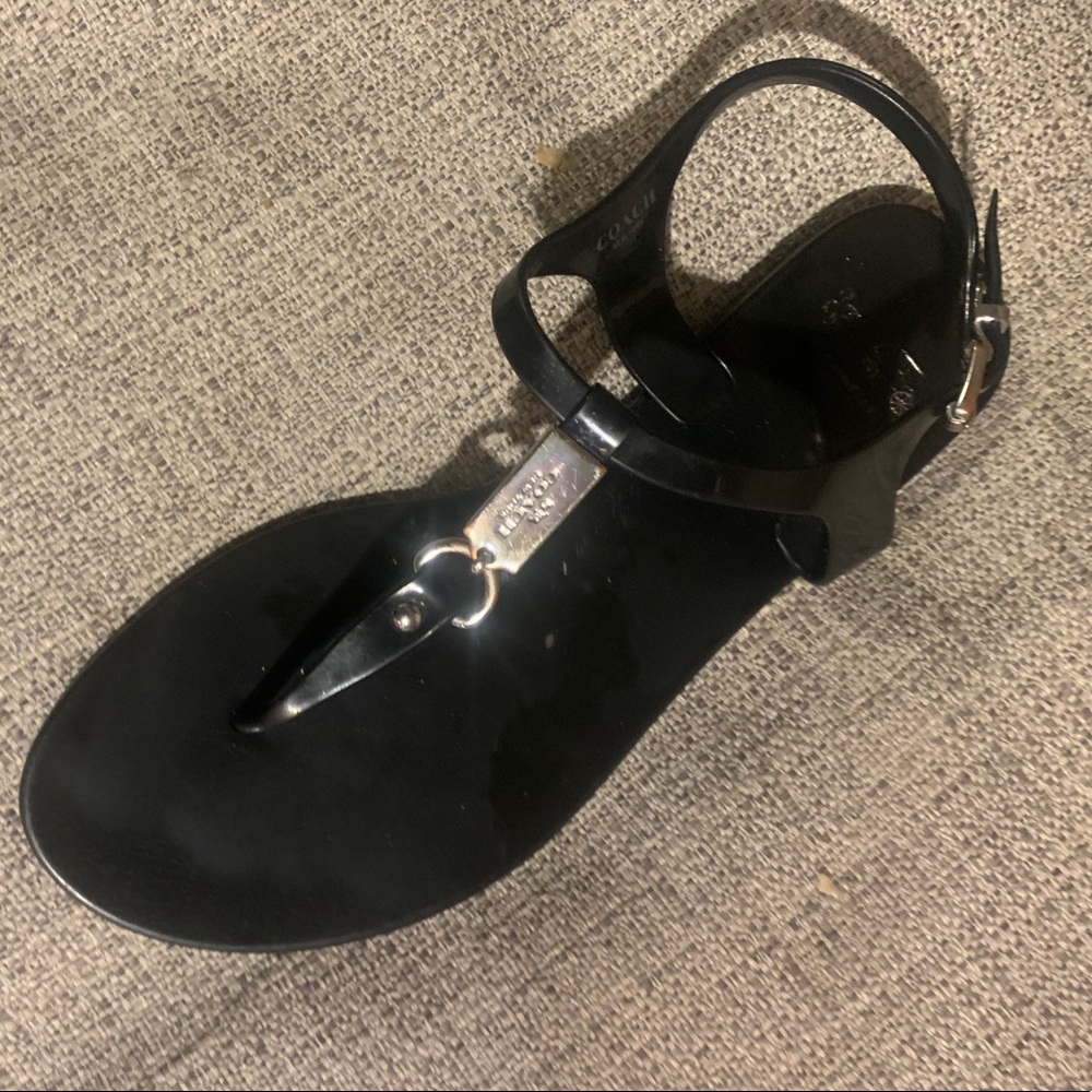 Coach women’s black flip flops